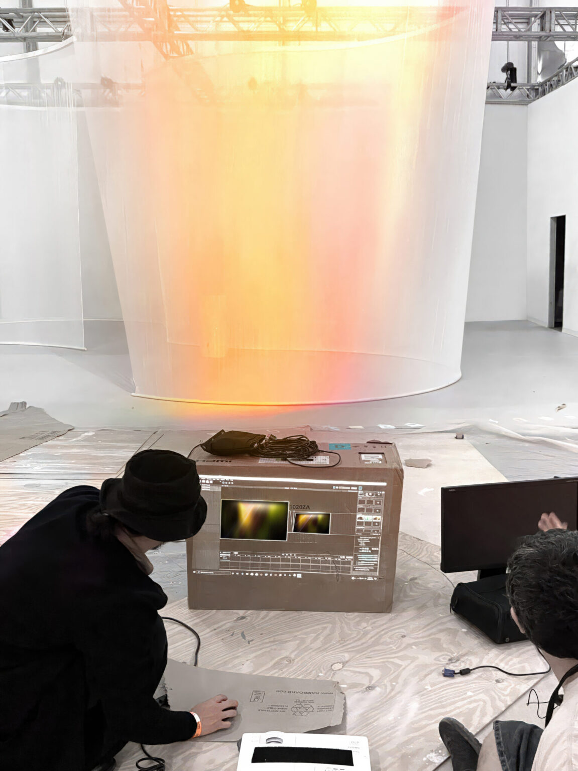 SUNSHOWER, Lexus. Installation by Nao Tamura. | Programming the light on site—the timeline projected on a shipping box.