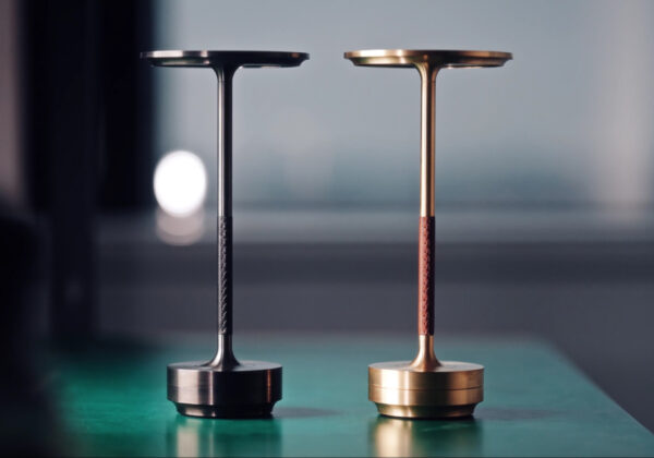 TURN CRAFT, Ambientec. Design by Nao Tamura. | Two variants. The Stainless Black, finished 
through a pioneering steel dyeing process, a first for Ambientec. 
The Brass, treated with a special oil finish that shifts in tone as it ages. 
Both are designed to change, not despite use, but because of it.