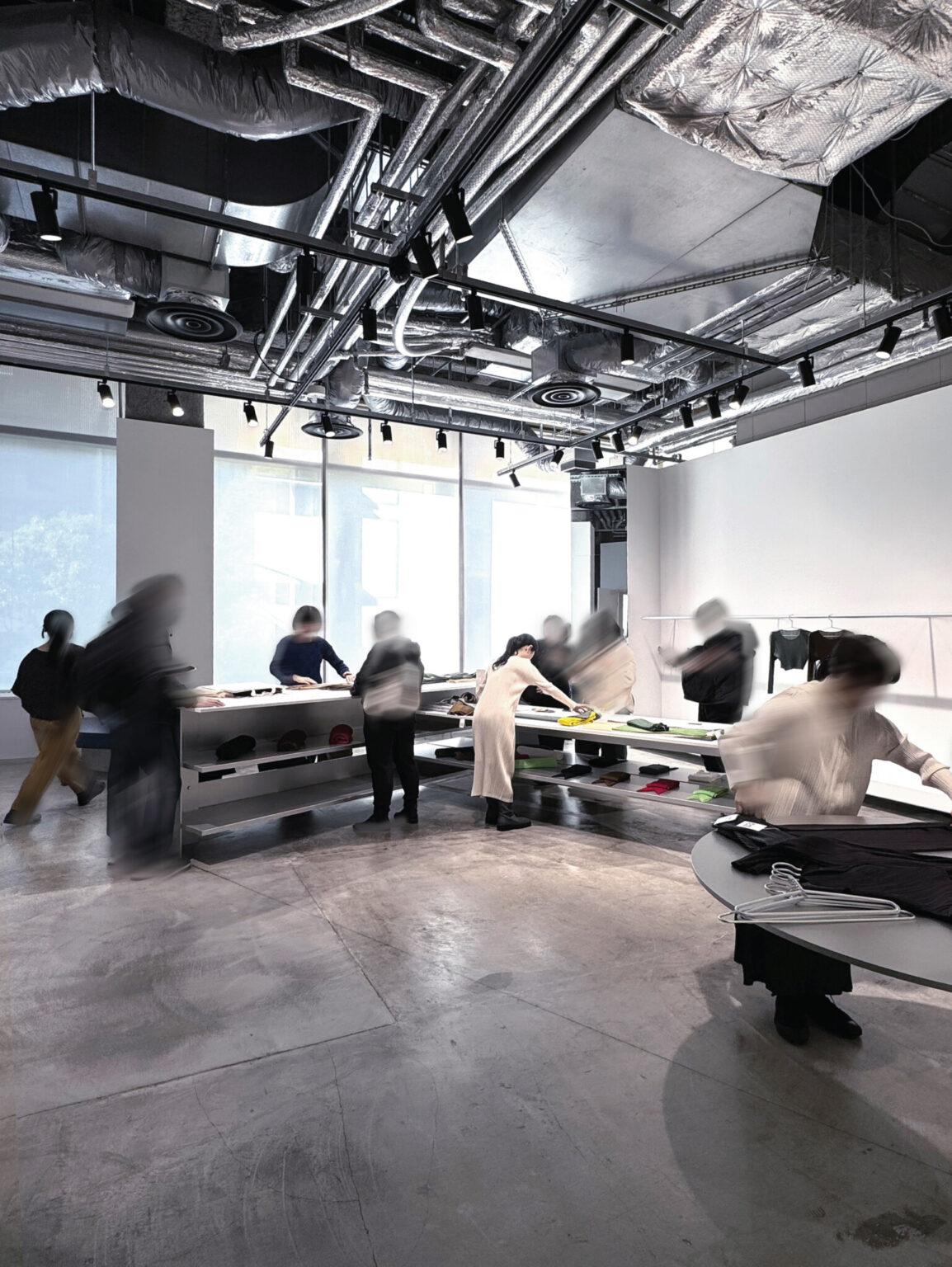 PLEATS PLEASE ISSEY MIYAKE Roppongi. Store design by Nao Tamura. | In operation—the store's own team, reconfiguring.