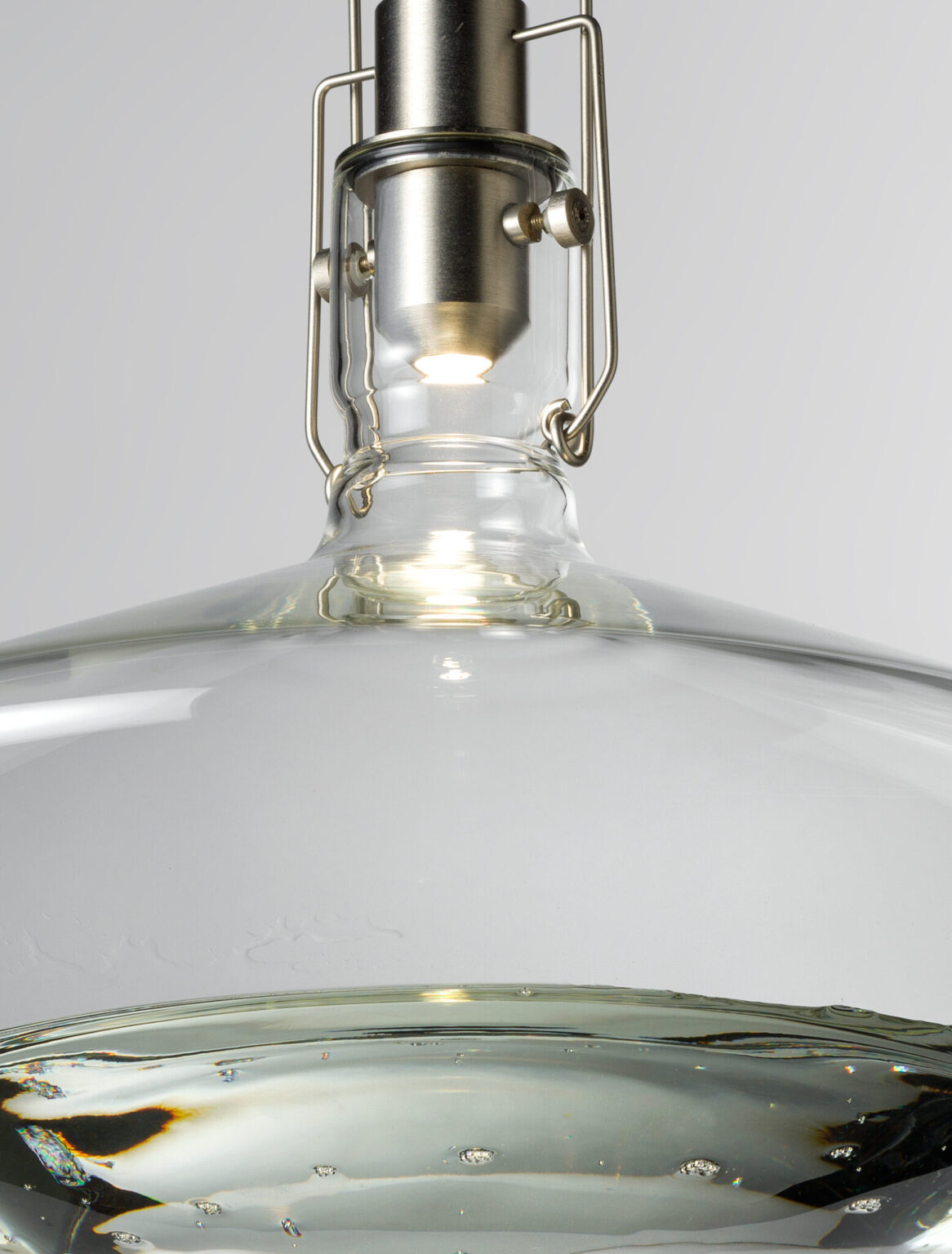 FLUID, WonderGlass. Design by Nao Tamura. | From the LED above, light travels the full body before it leaves.
