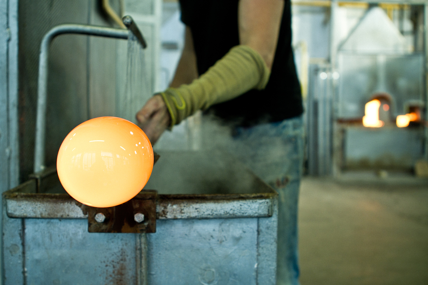 FLUID, WonderGlass. Design by Nao Tamura. | The gather, still molten—the moment glass is closest to water.