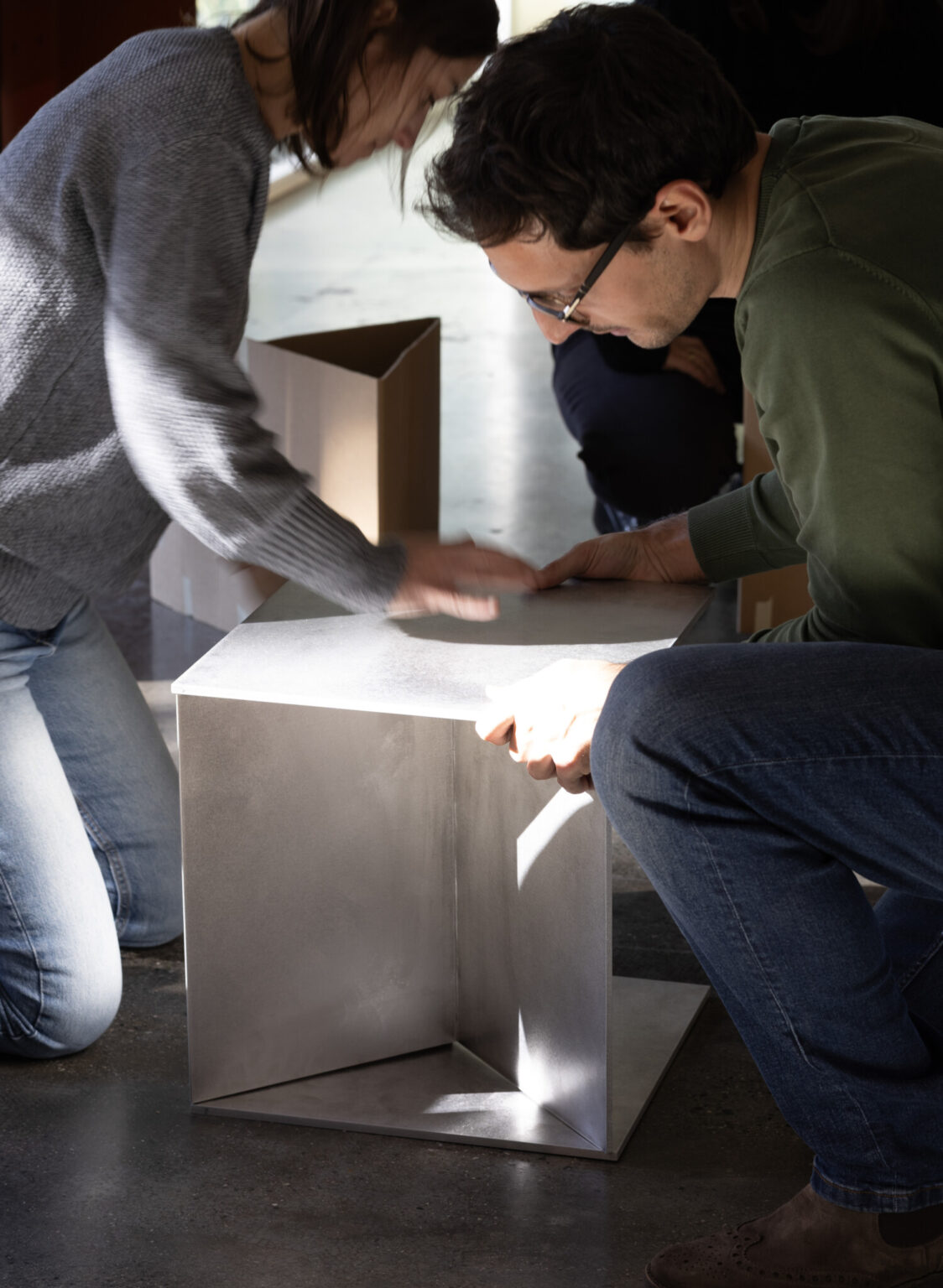 RYO, Porro. Design by Nao Tamura. | First aluminum modules, in hand—checking the fold.